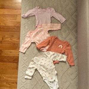 Four cloud 9 onesies new, washed and never worn